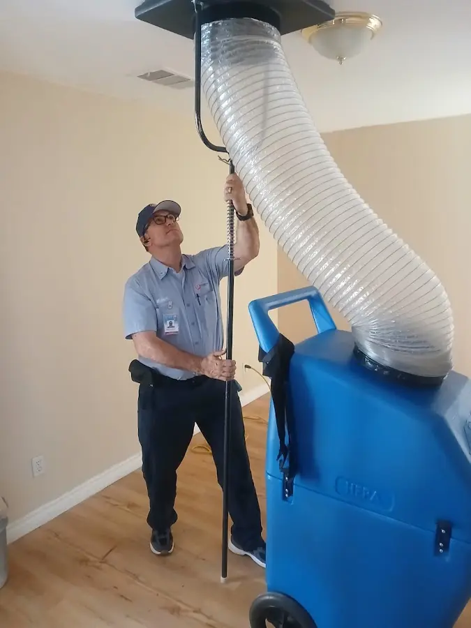 HVAC Installation technician using HEPA equipment in Coral Terrace